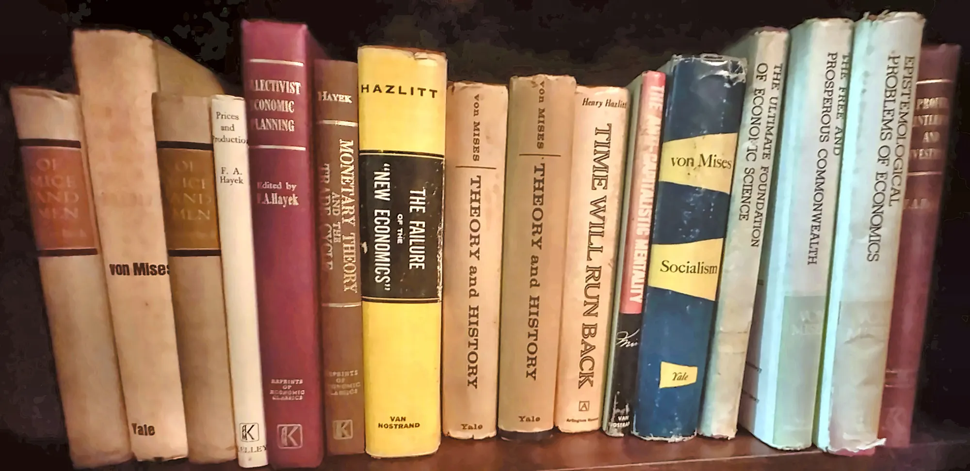 A shelf of Mises, Hayek and Hazlitt books, many in their original dust jackets